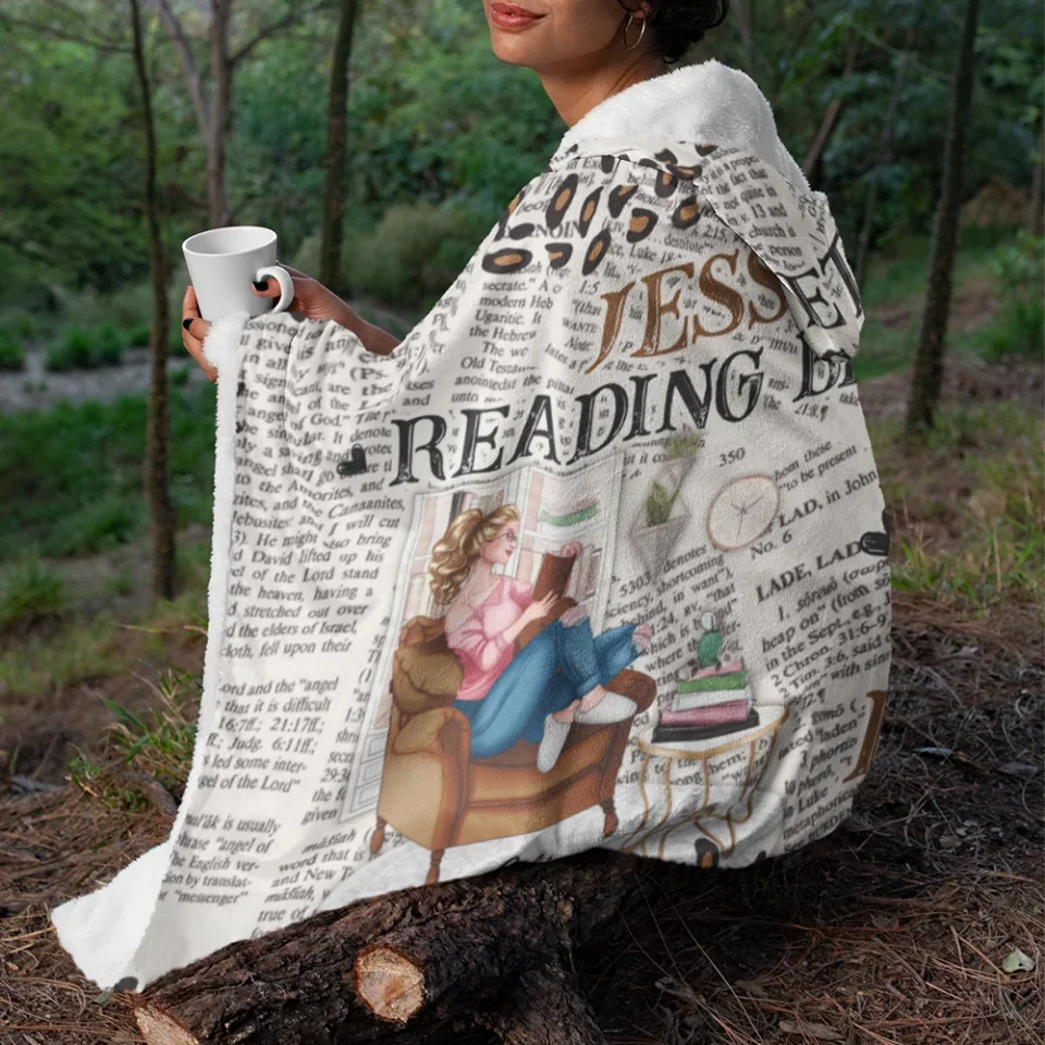 hooded-fleece-blanket-mockup-of-a-woman-sitting-in-the-woods-28145