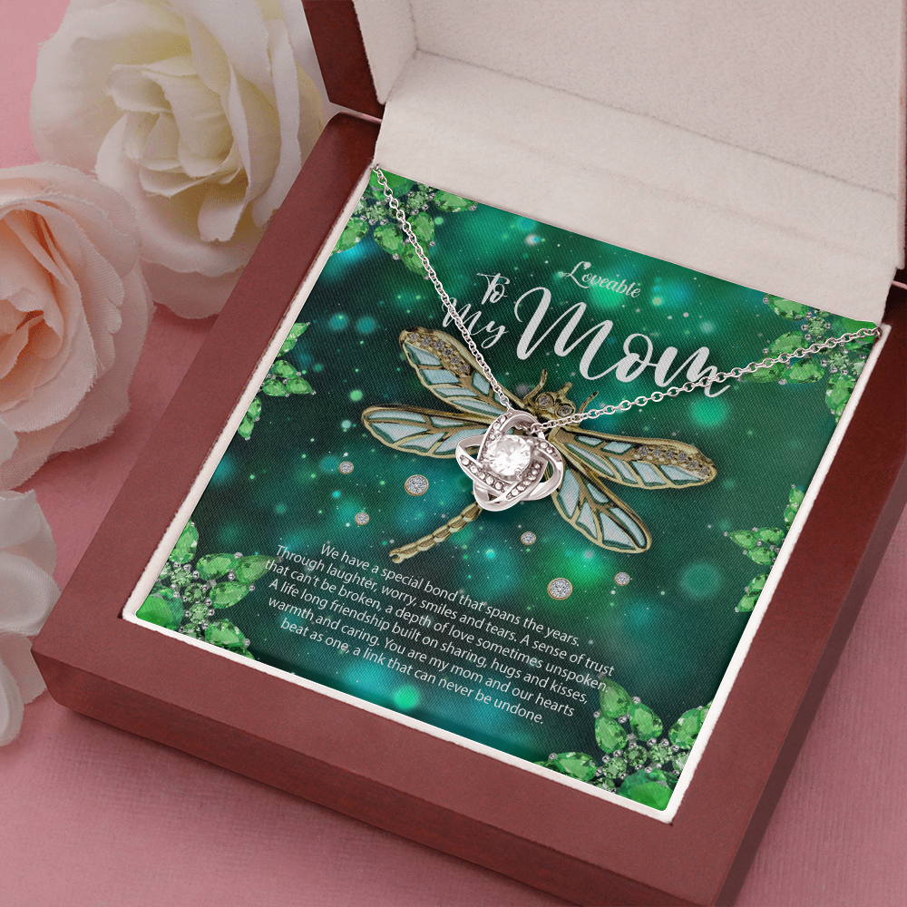 mom white gold diamond necklace