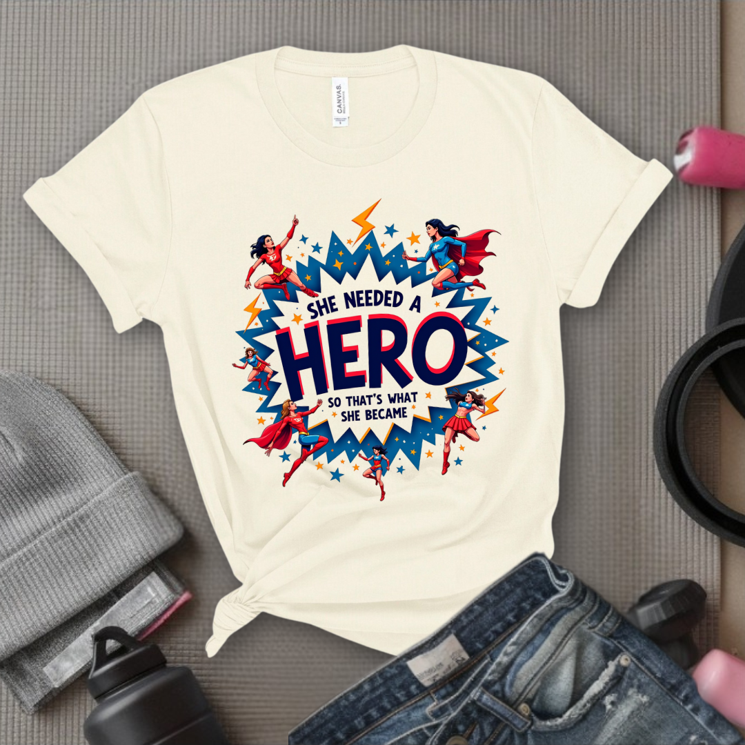 She Needed A Hero - Unisex Jersey Short Sleeve Shirt - Gift for Yourself - Bella Canvas 3001